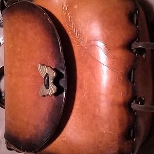 Hard case bag has etching in the leather no marks no tags no dates